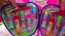 4 Flavored Shopkins Lip Balm Single Packs and 2 zip cases with 5 Scented Lipbalms Cookiesw