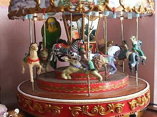 Buddy riding the merry-go-round