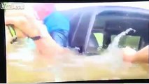 Bodycam captures cops rescuing man and grandson from flood