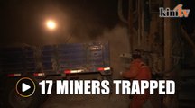 China battles to save trapped miners