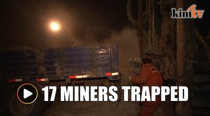 China battles to save trapped miners
