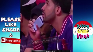 Drake caught looking a Meek and Nicki Minaj's picture