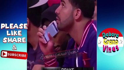 Drake caught looking a Meek and Nicki Minaj's picture