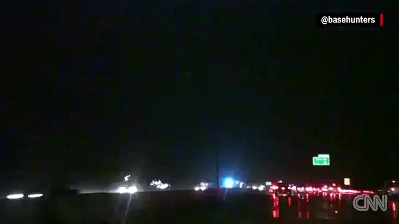 Massive tornado roars across highway