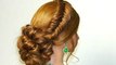 Hairstyle for long hair. Messy bun with fishtail braid