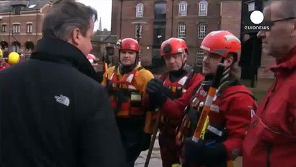 Cameron promises more funds for flood defence