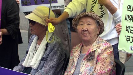 FILE: South Korea, Japan strike deal on comfort women