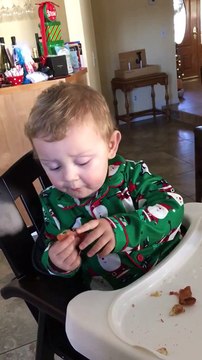 Cute little Kid eats Bacon for the first time and screams of Joy
