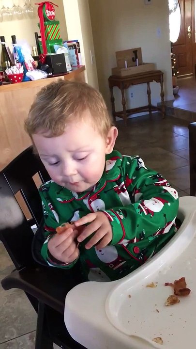 Cute little Kid eats Bacon for the first time and screams of Joy