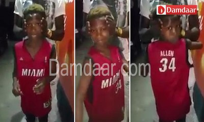 Boy twist his head around a full 180 degrees.