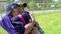 Father on R&R Surprises His Two Daughters at Softball Game