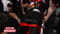 Triple H helped by paramedics after being attacked by Roman Reigns WWE.com Exclusive, Dec