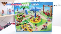 Parque infantil de Playmobil con columpios, toboganes, castillo, balancín y barbacoa