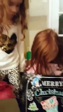 Girl cries after receiving Black Baby Doll for Christmas