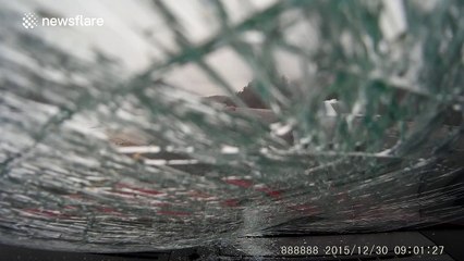 Flying ice sheet smashes car windscreen in US