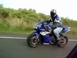 Yamaha R1 sport bike against BMW moto Unrealistic tricks during the race