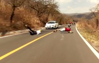 Longboarder Crashes Head First Into Oncoming Car