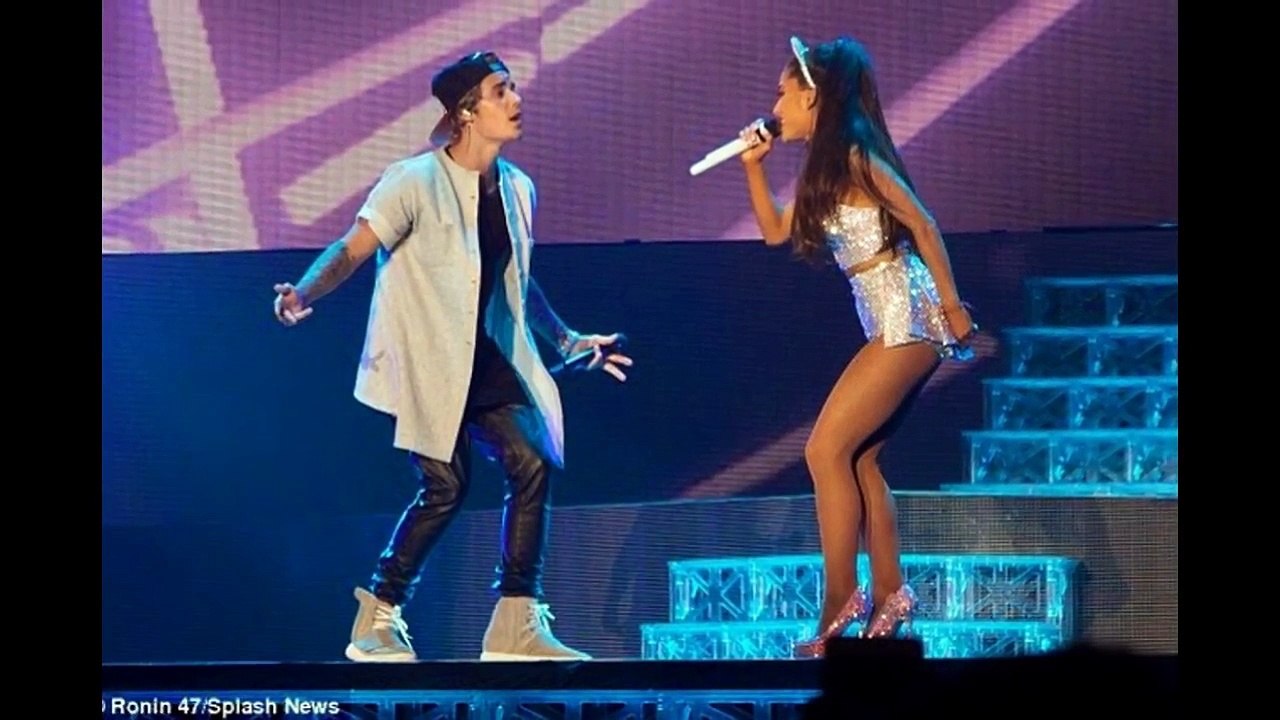 HOT %## Justin Bieber embrace Ariana Grande during live concert