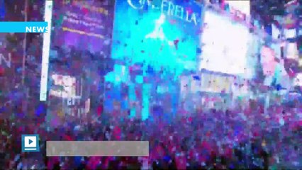 New Year's Eve revelers pack NYC's Times Square under tight security