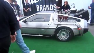 2014 CES Actor Christopher Lloyd with the Delorean and Gibson guitar from the movie