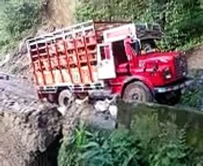 Northern India landslide takes down road and truck