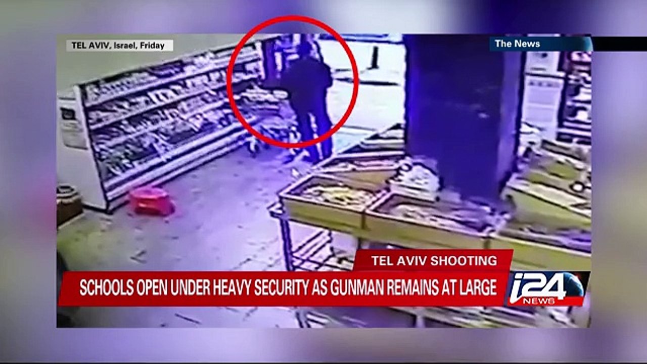 Schools open under heavy security in Tel Aviv as gunman remains at large