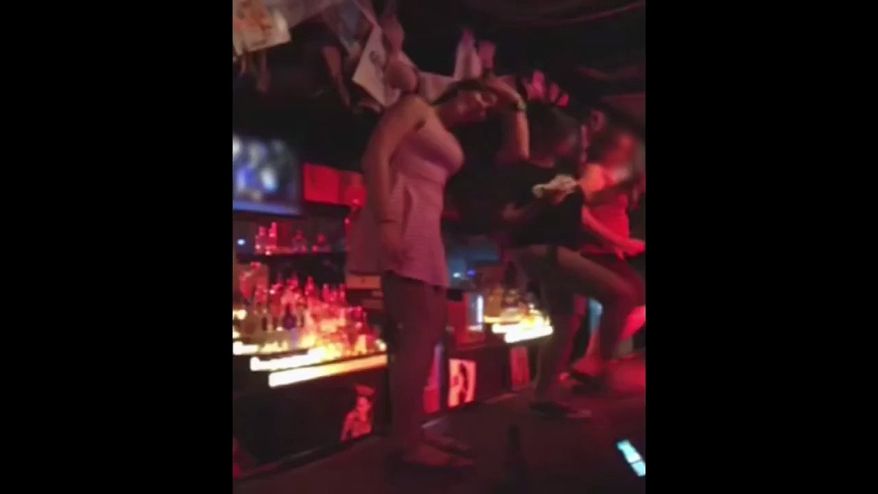 Woman Falls Dancing on Bar Counter