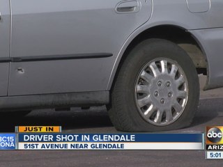 Car shot at after people start arguing