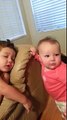 Baby sister tries to wake her big brother