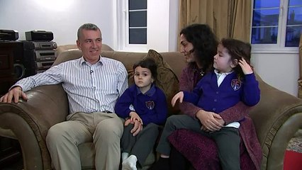 Ashya King celebrates his first day back at school