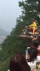 Greatest and dangerous stunt of 2015! biking on a rope?