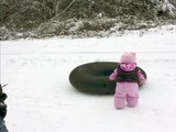 Dog Slides Across the Snow Funny Way!