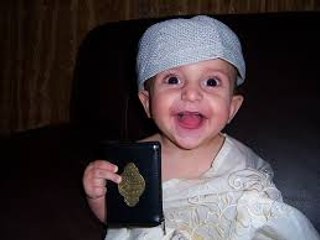 Little boy is crazy at Quran sharif - Amazing  Video