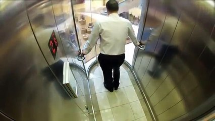 Police playing jokes in elevator