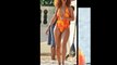 Rihanna on swimsuit while paddleboarding in Barbados