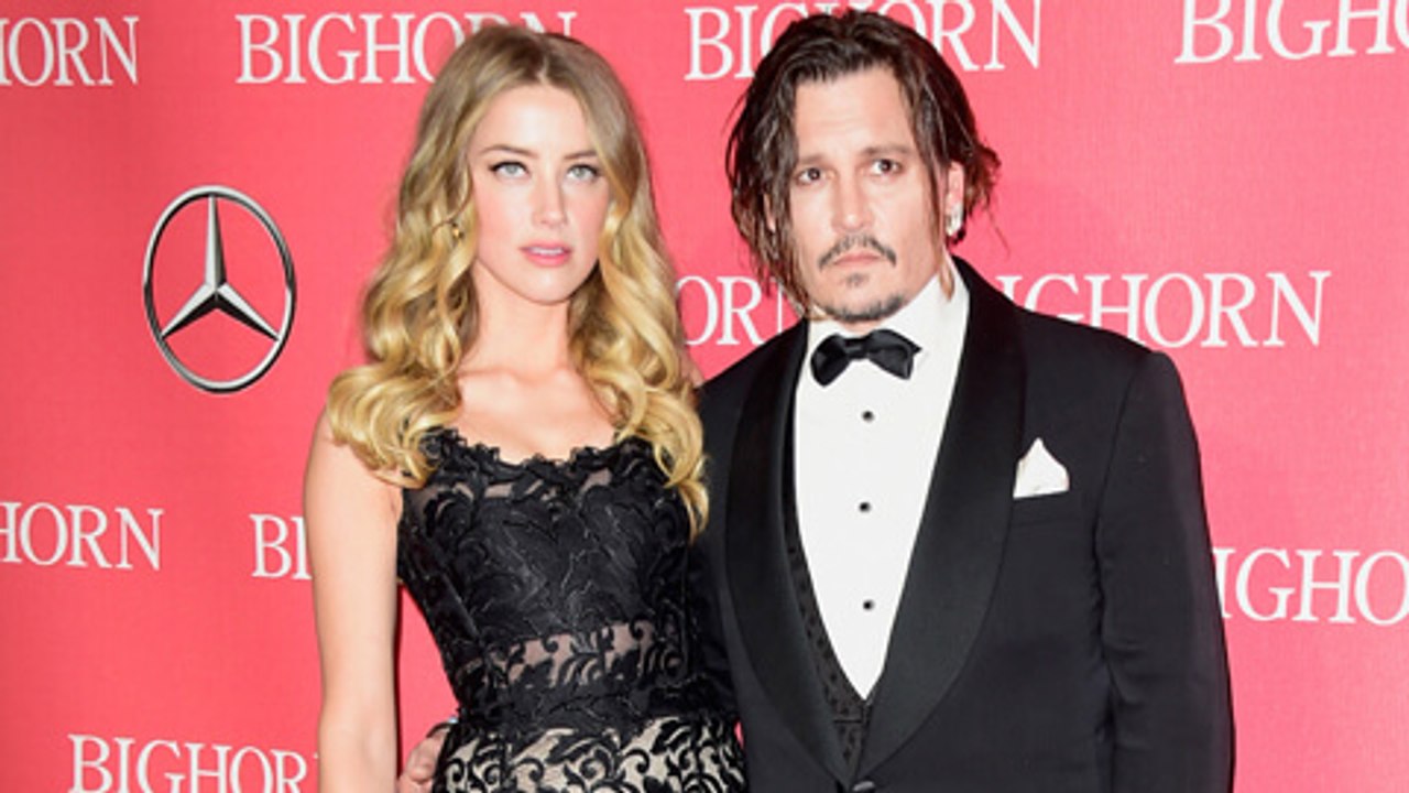 (VIDEO) PDA Alert! Johnny Depp, Amber Heard Look CUTE On The Red Carpet
