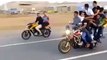 Crazy Arab Biker doing 1 wheeling with 10 boys amazing stunt