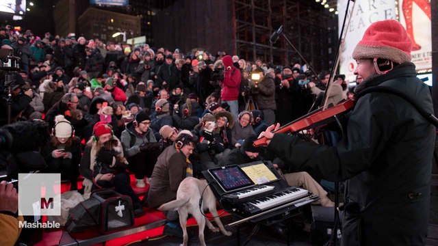 Watch pups fill Times Square for a musical tribute to 9/11 rescue dogs
