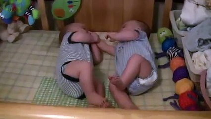 Twin Baby Boys Laughing at Each Other