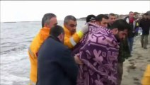 Coastguards rescue survivors after refugee boats capsize off Turkey