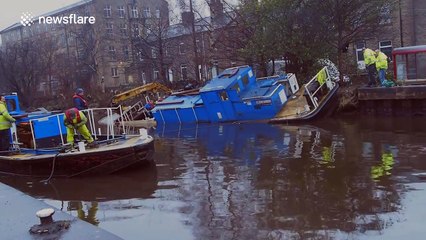 Boat rescued from canal bank after flooding