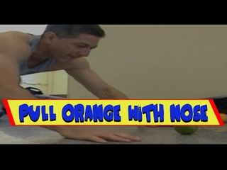 Man Smashes Guinness World Records for Rolling Orange with Nose