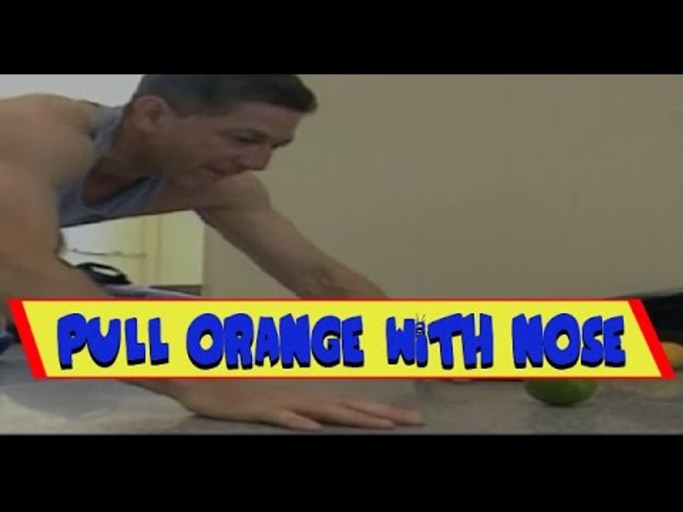 Man Smashes Guinness World Records for Rolling Orange with Nose