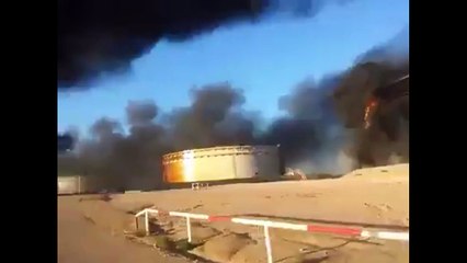Libya oil storage tanks set fire during IS assault