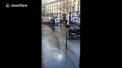 Police run into Paris attack cordon as public evacuated from inside