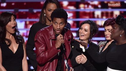 Sharon Osbourne literally kicks crasher off the stage