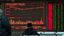 China markets closed early as shares slump 7%