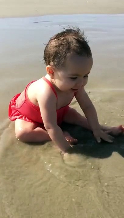 Baby's first time at the beach