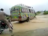 Motorcycle Rider Swept by Flood