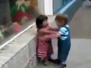 A small boy hugs little girl funny video